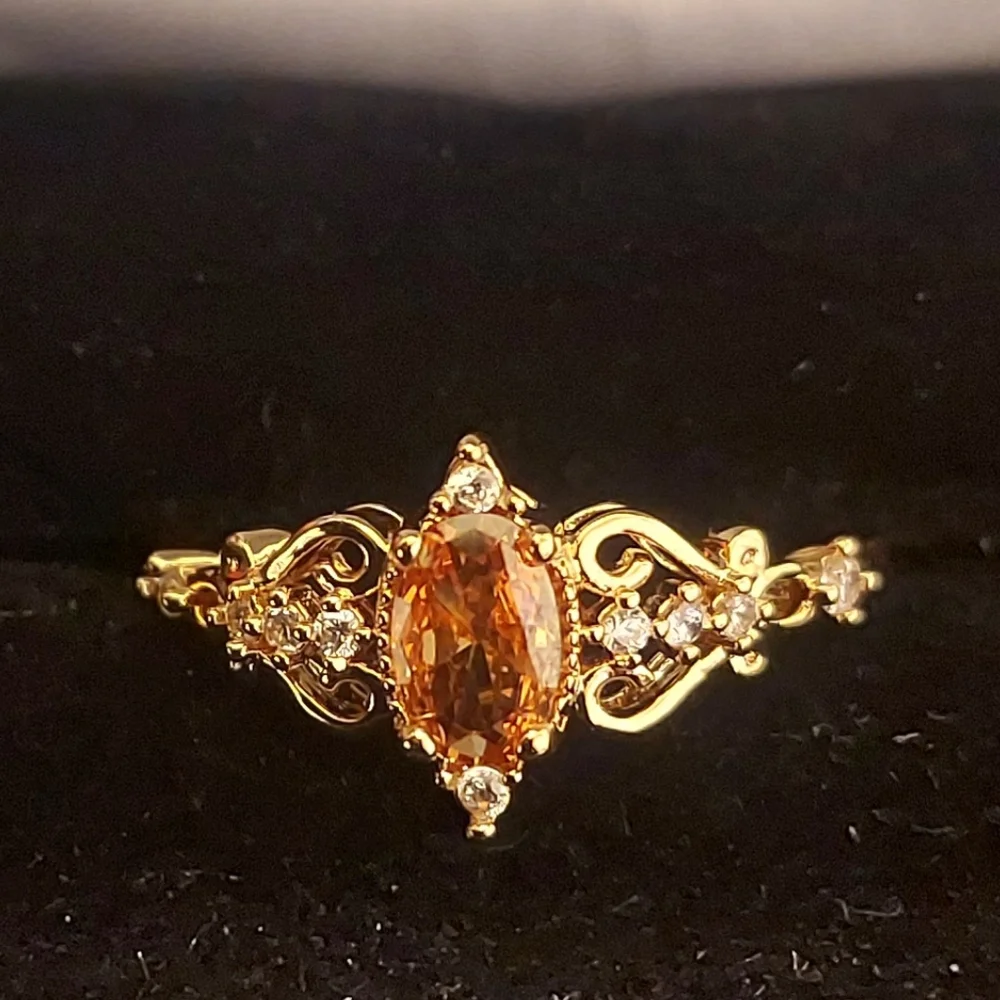 Elegant Gold Ring with Orange Gemstone - Picture 1 of 3